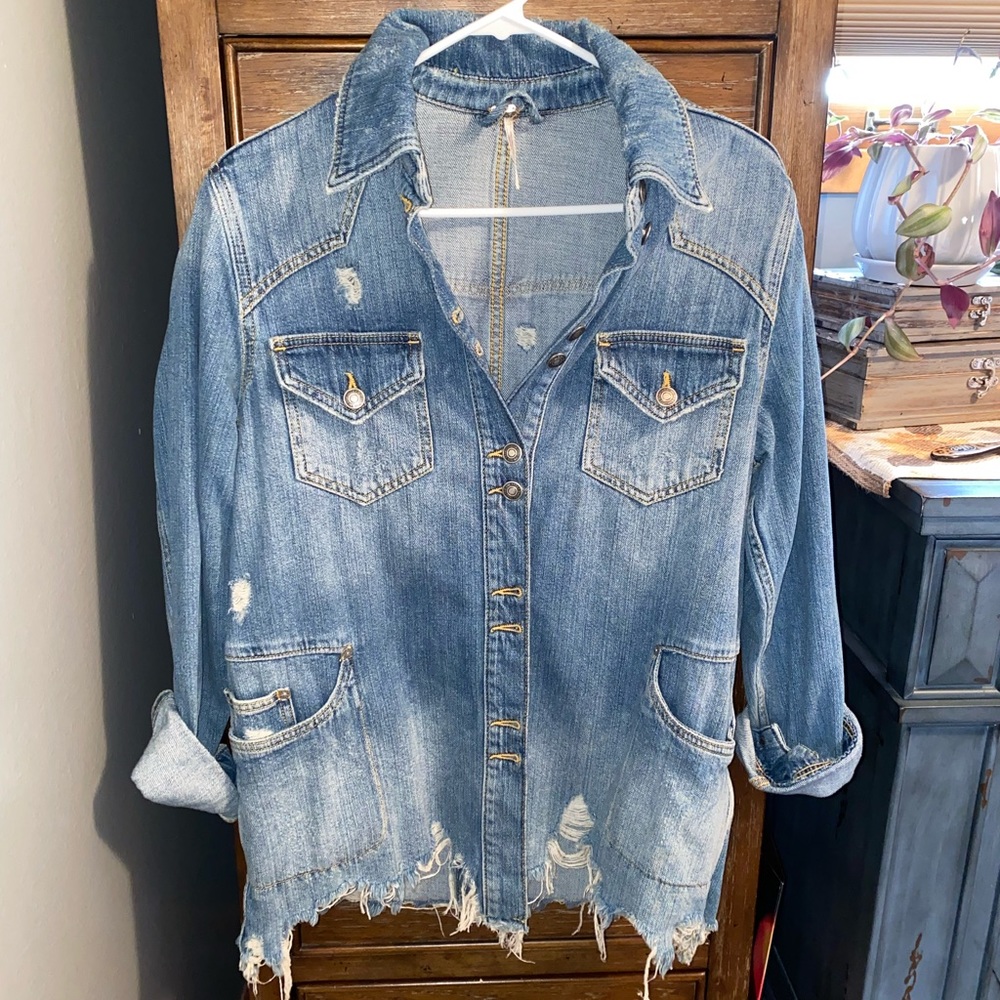 Women’s destroyed denim jacket
